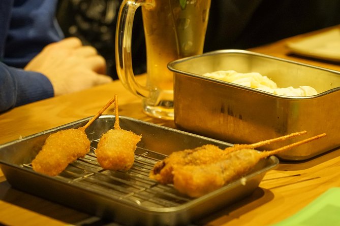Osaka Local Foodie Walking Tour in Dotonbori and Shinsekai - Exploring Dotonbori: A Food Lovers Paradise