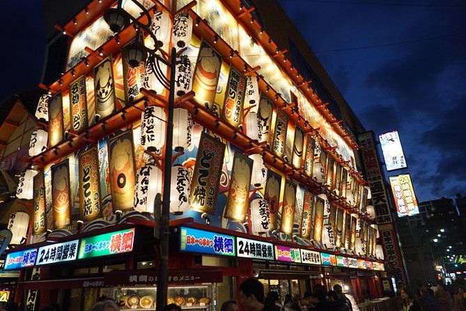 Osaka Local Foodie Walking Tour in Dotonbori and Shinsekai - Okonomiyaki: The Iconic Osaka Street Food Experience