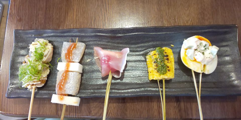 Osaka: Shinsekai Food Tour With 13 Dishes at 5 Eateries - A Fascinating Blend of Tradition and History
